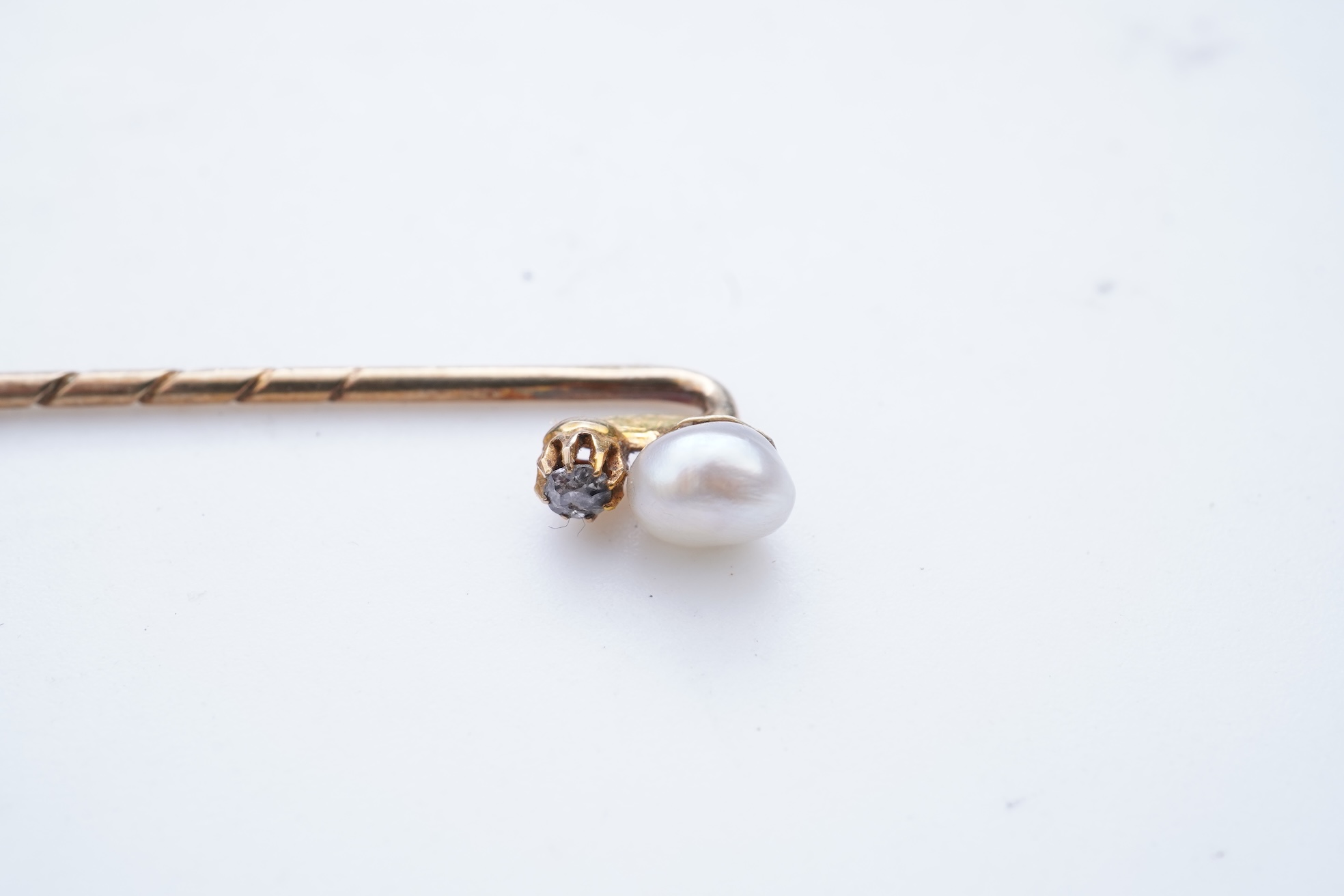 Two cameos and a stick pin, 19th century